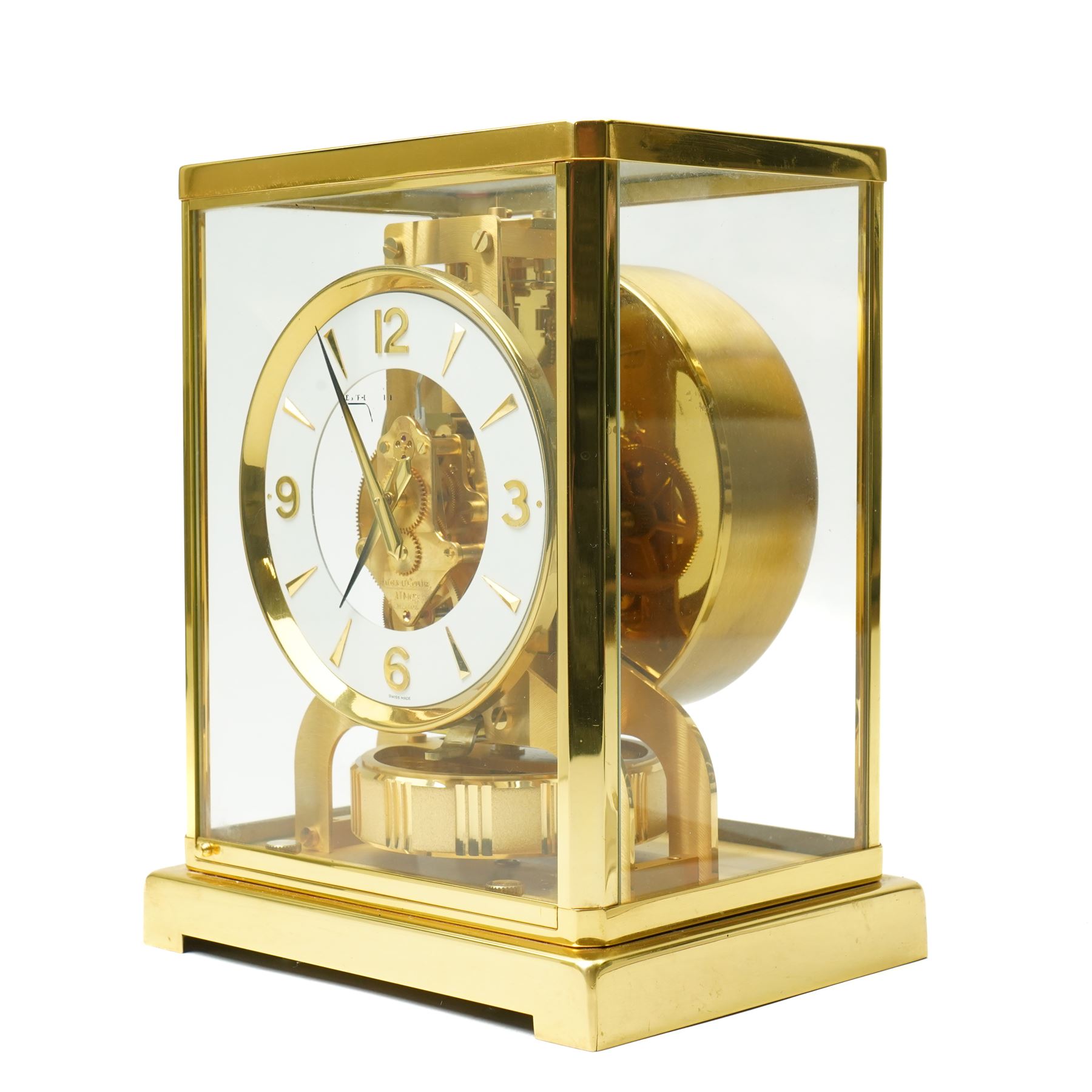 Jaeger- LeCoultre Atmos clock No.291241, with white dial in brass and five glass case and outer carrying case with instruction booklet and original receipt dated 1970 H22cm