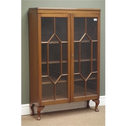  Early 20th century astragal glazed mahogany bookcase, two doors enclosing three adjustable shelves, cabriole feet (W79cm, H120cm, D27cm), and a Victorian inlaid walnut drop leaf table, column supports with splayed carved feet (W87cm, H68cm, L116cm)   