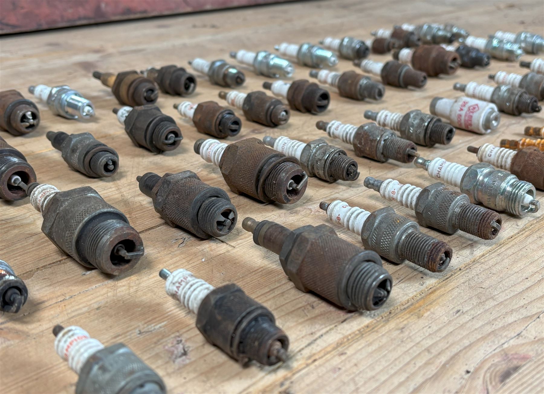 Group of collectable spark plugs, mostly used, mainly by Champion, and some earlier examples by K.L.G.  - COLLECTION BY APPOINTMENT FROM: The White House, Thirsk Road, Easingwold, York, YO61 3NF - CALL 01723 507111 TO ARRANGE