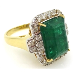  18ct gold emerald and diamond cluster ring, emerald approx 6.9 carat, diamonds approx 0.9 carat  