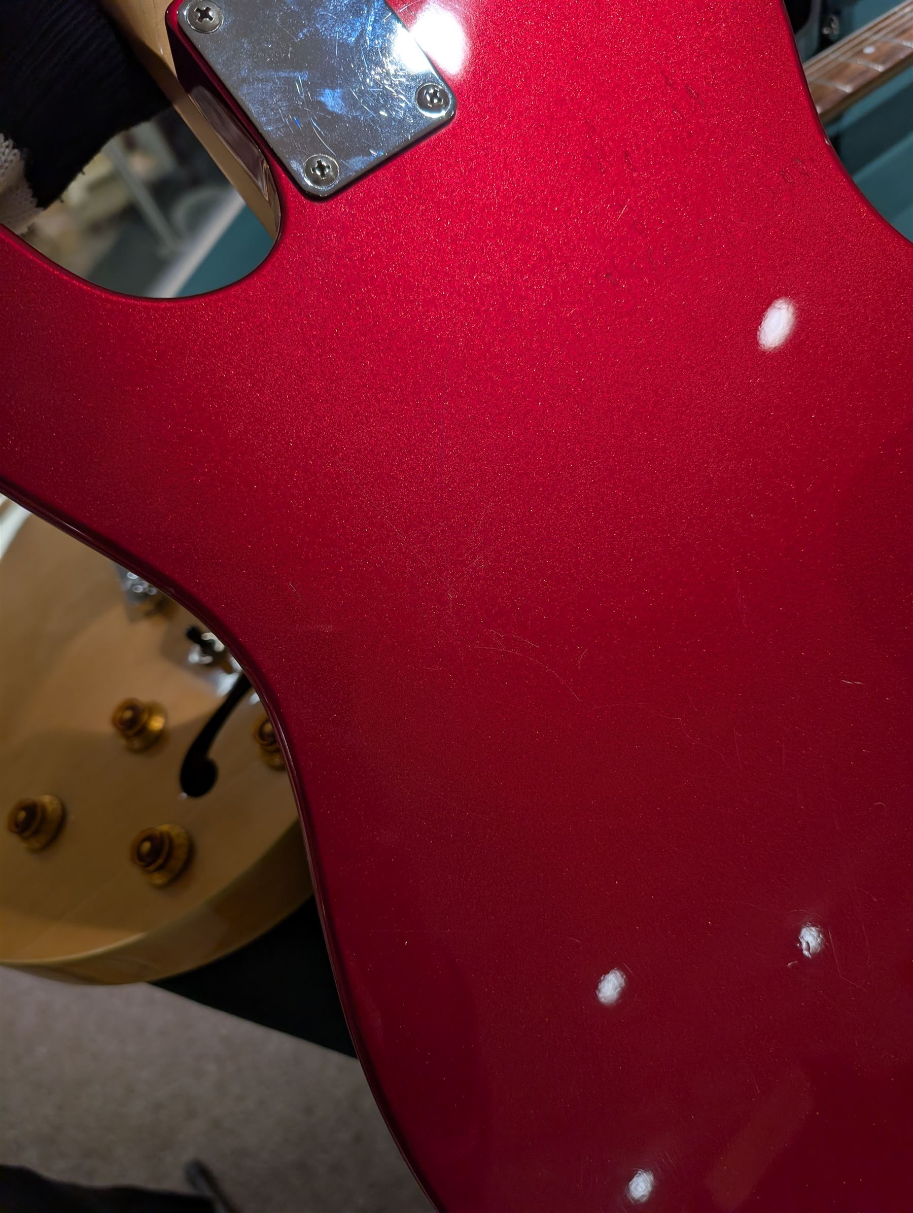 Fender Telecaster electric guitar, serial no. T021384 made in Japan c.1994, with Candy Apple Red body, white scratch plate and maple neck, guitar L98cm