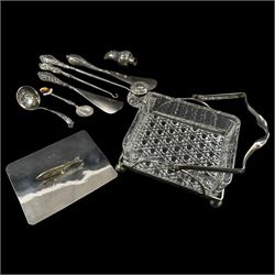 Silver handled button hooks and shoe horns, cut glass jar with silver lid, two silver spoons and an EPNS glass serving dish 
