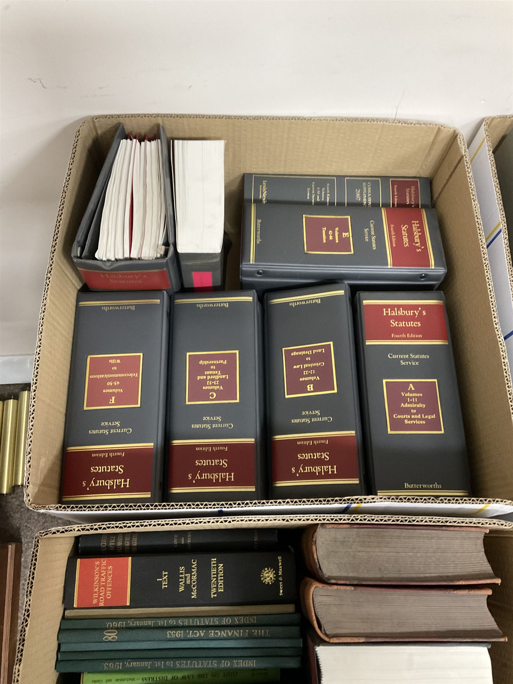 Large collection of law books, to include Halsbury’s Statutes, Atkin’s Court Forms, Current Law Year Books etc, in seventeen boxes