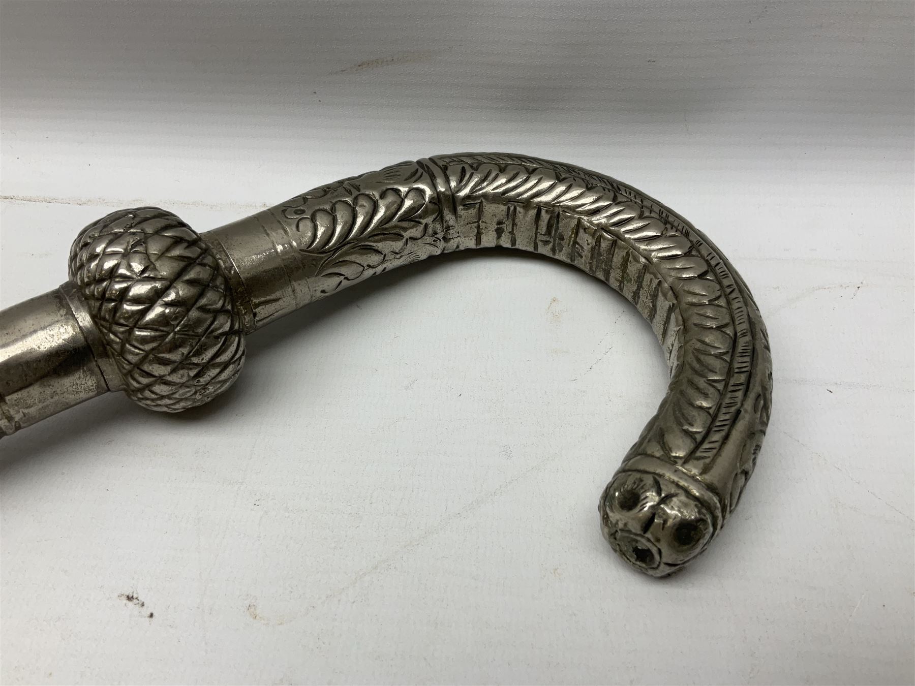 Reproduction non-firing flintlock pistol with brass skull crusher butt, the lock-plate inscribed 'Tower' and 'GR' L40cm; Sabre Japan Original Bowie Knife in sheath; and Indian embossed nickel two-piece walking cane (3)