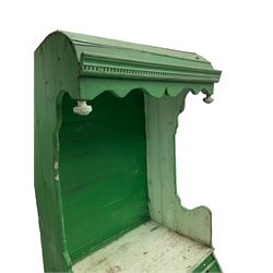 19th century painted pine hen coop settle, overhanging arched canape with dentil moulding and shaped edge, the panelled seat over a triangular platform base with removable hen-coop door, in green and white finish