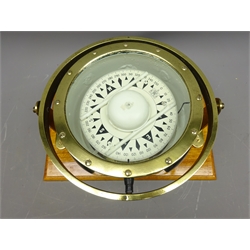  Early 20th century Marine Compass black case with white dial and brass bezel in gimball stamped 1517,on wooden plinth with plaque 'SS City of Karachi, J.R.Ellerman & Co. 1905-1934 5547 tons' Diam 24cm, L38cm  