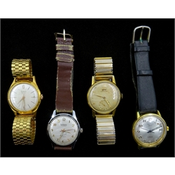 Four vintage Swiss wristwatches by Bernex, Dubois Bros, Delvina. Tissot