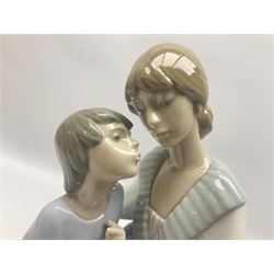 Lladro figure, Mothers Day, modelled as a mother with her two children, sculpted by Francisco Catalá, with original box, no 5596, year issued 1989, year retired 1998, H24cm