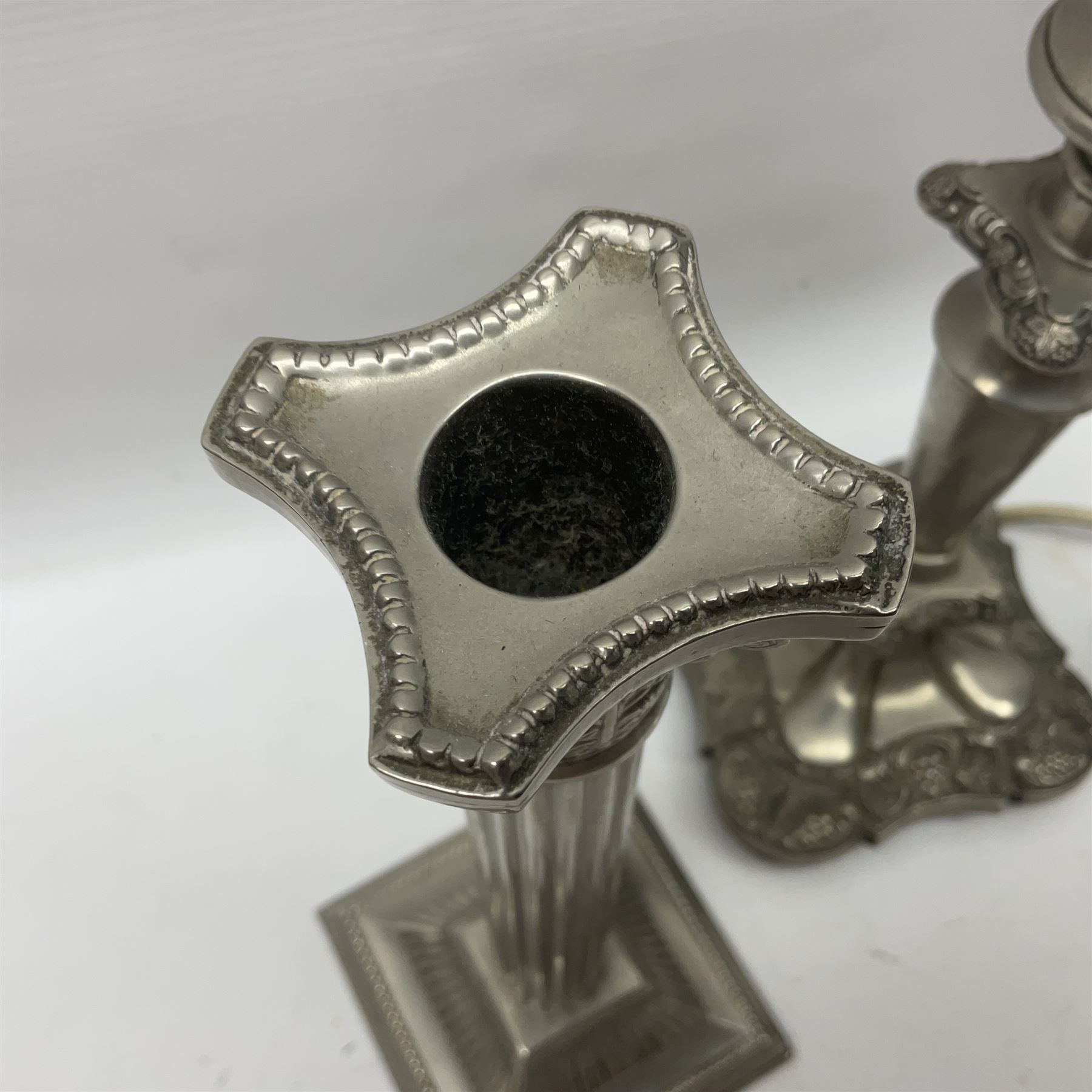 Pair of Corinthian column candlesticks, and a silver plated lamp, candlesticks H26cm