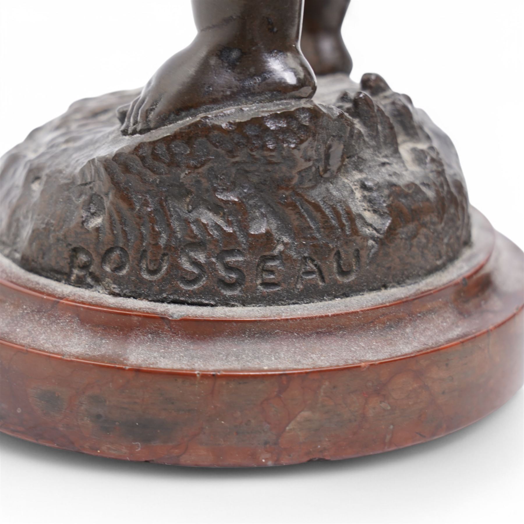 After Rousseau - Pair of bronze figures of cherubs, one holding a toy elephant, the other originally with an artists board on marble bases H23cm