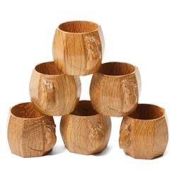 Mouseman - set of six oak napkin rings, with carved mouse signature, by the workshop of Ro...