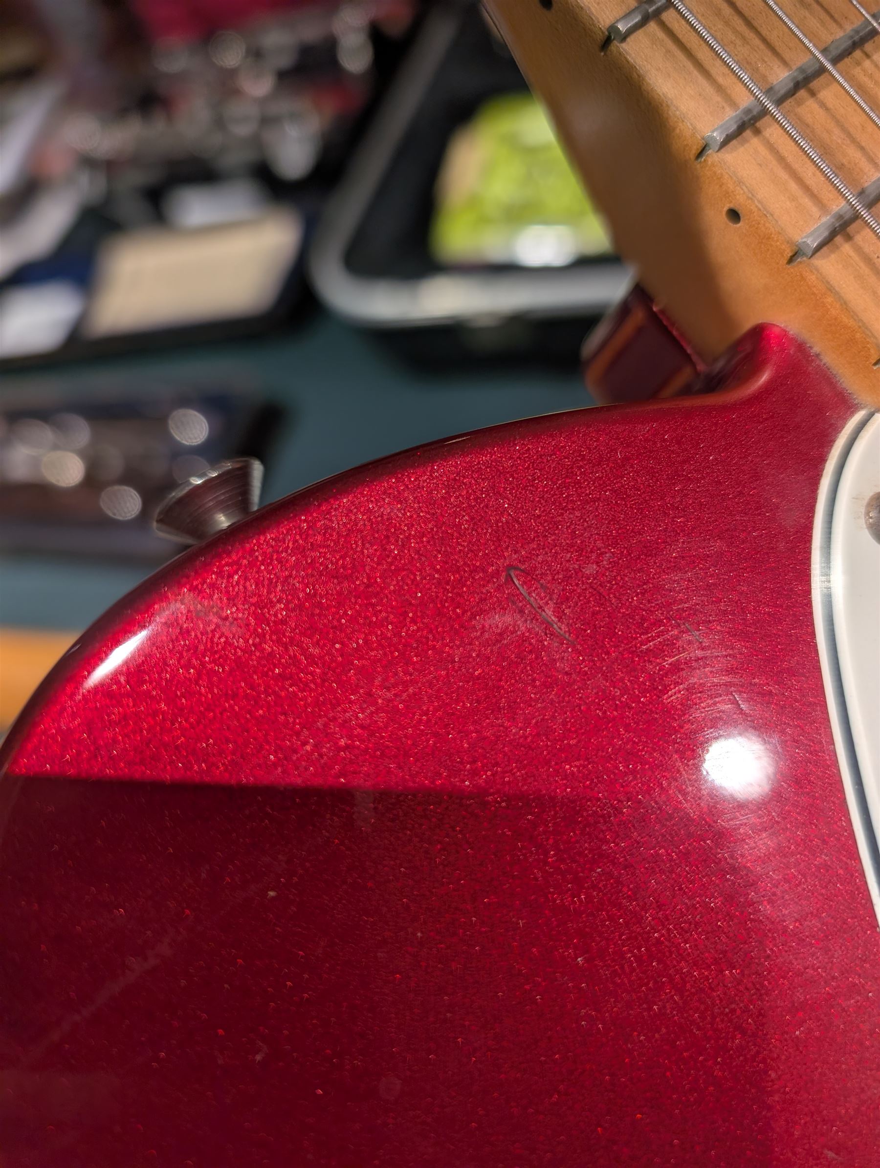Fender Telecaster electric guitar, serial no. T021384 made in Japan c.1994, with Candy Apple Red body, white scratch plate and maple neck, guitar L98cm