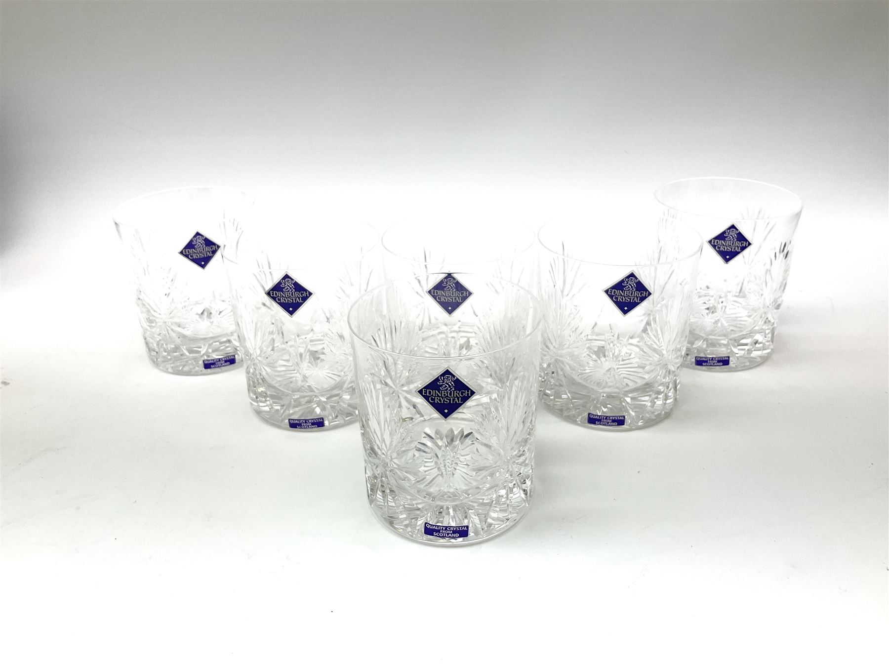 Edinburgh Crystal set, comprising square decanter, six old fashioned tumblers on a gallery tray, together with Edinburgh crystal water jug. 