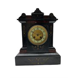 A late 19th century French eight-day mantle clock striking the hours and half hours on a coiled gong (missing), in a Belgium slate case with a shaped pediment and inlaid rouge marble panels and incised decoration to the front, two-part dial with a gilt centre, enamel chapter ring with upright Arabic’s and minute markers, steel fleur de Lis hands within a cast bezel with a flat bevelled glass, dial inscribed M Spiegelhalter and Sons, Paris. With pendulum, No key.
 H 34cm W 28cm D 13cm
With another 19th century French eight-day mantle clock striking the hours and half hours on a bell, in a Belgium slate case with a flat pediment and inlaid rouge marble panels and incised decoration to the front, enamel dial with roman numerals and minute markers, steel moon hands (hour hand broken) within a cast bezel, glass missing. No pendulum or key.
H 25cm W25cm D13cm

