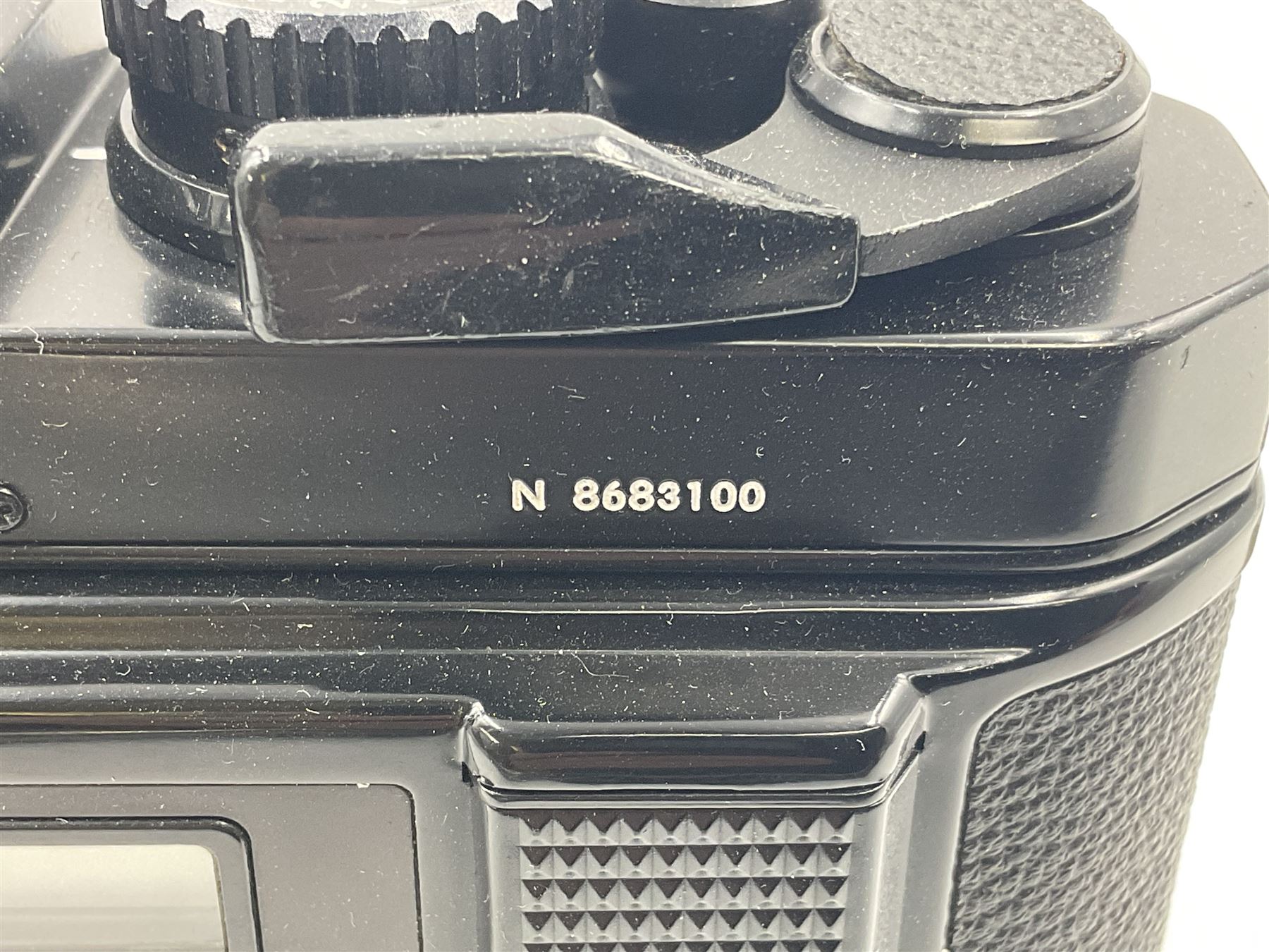 Nikon FM2n camera body, serial no. N8683100, with 'Nikon Zoom-NIKKOR 35-70mm 1:3.3-4.5' len, serial no. 2236565, Nikon MF-16 data back, serial no. 212905 and Nikon MD-12 Motor Drive, serial no 1570382 