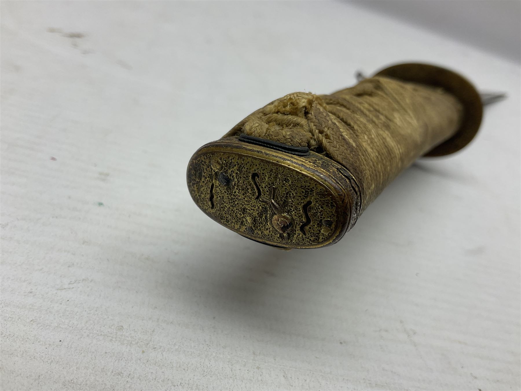 Japanese tanto dagger with 25cm single edged blade, gilded plain punched tsuba, cord bound ray skin grip incorporating menuki and ornate gilded metal mounts L39cm overall