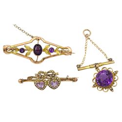 Edwardian gold amethyst and seed pearl double heart brooch, gold circular amethyst pendant, and a gold three stone amethyst brooch, all stamped 9ct