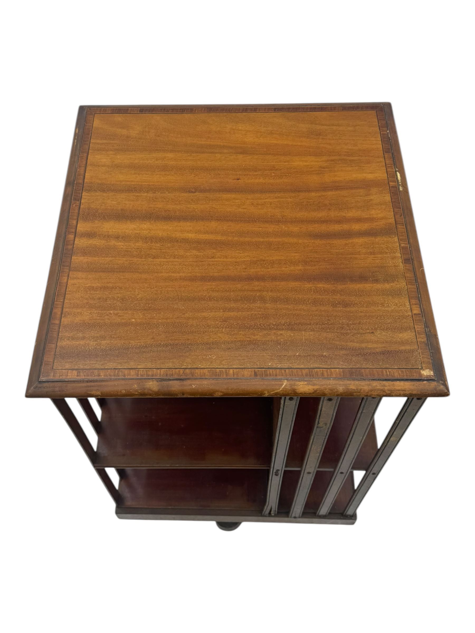19th century oak chest of drawers, rectangular moulded top over two short and two long drawers, on plinth base (W99cm, D53cm, H81cm); early 20th century glazed mahogany display cabinet; Edwardian mahogany revolving bookcase (3)
