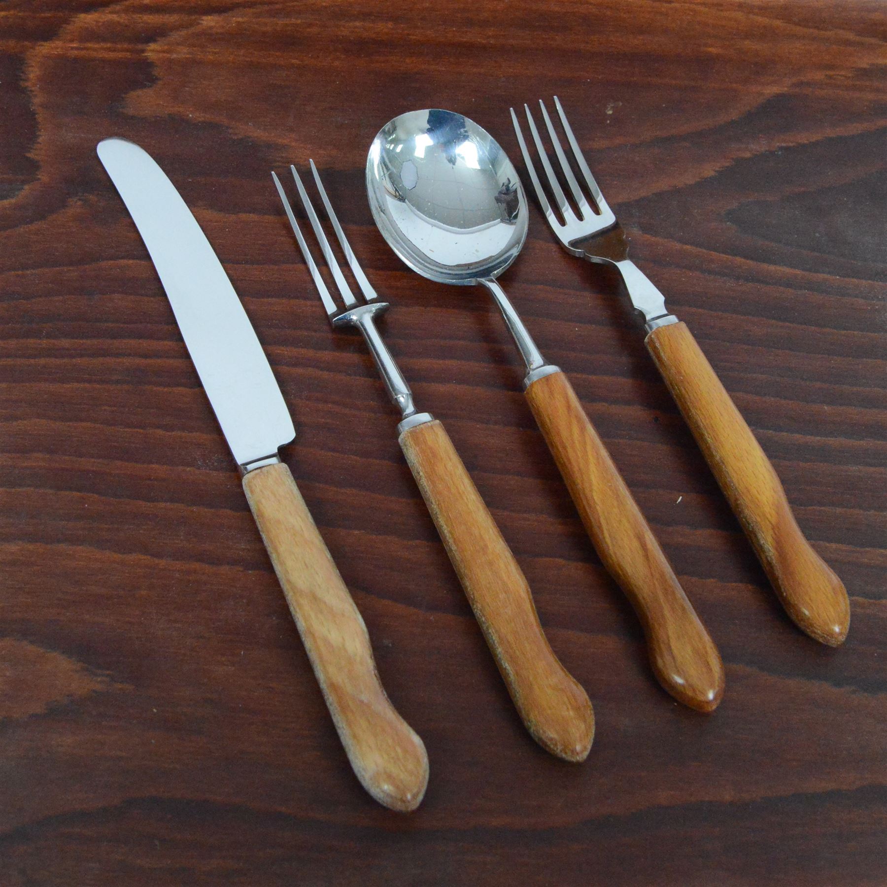 1960's fitted canteen of Sanenwood wooden handled stainless steel cutlery for six covers, including additional fish eaters with slide off tray cover 