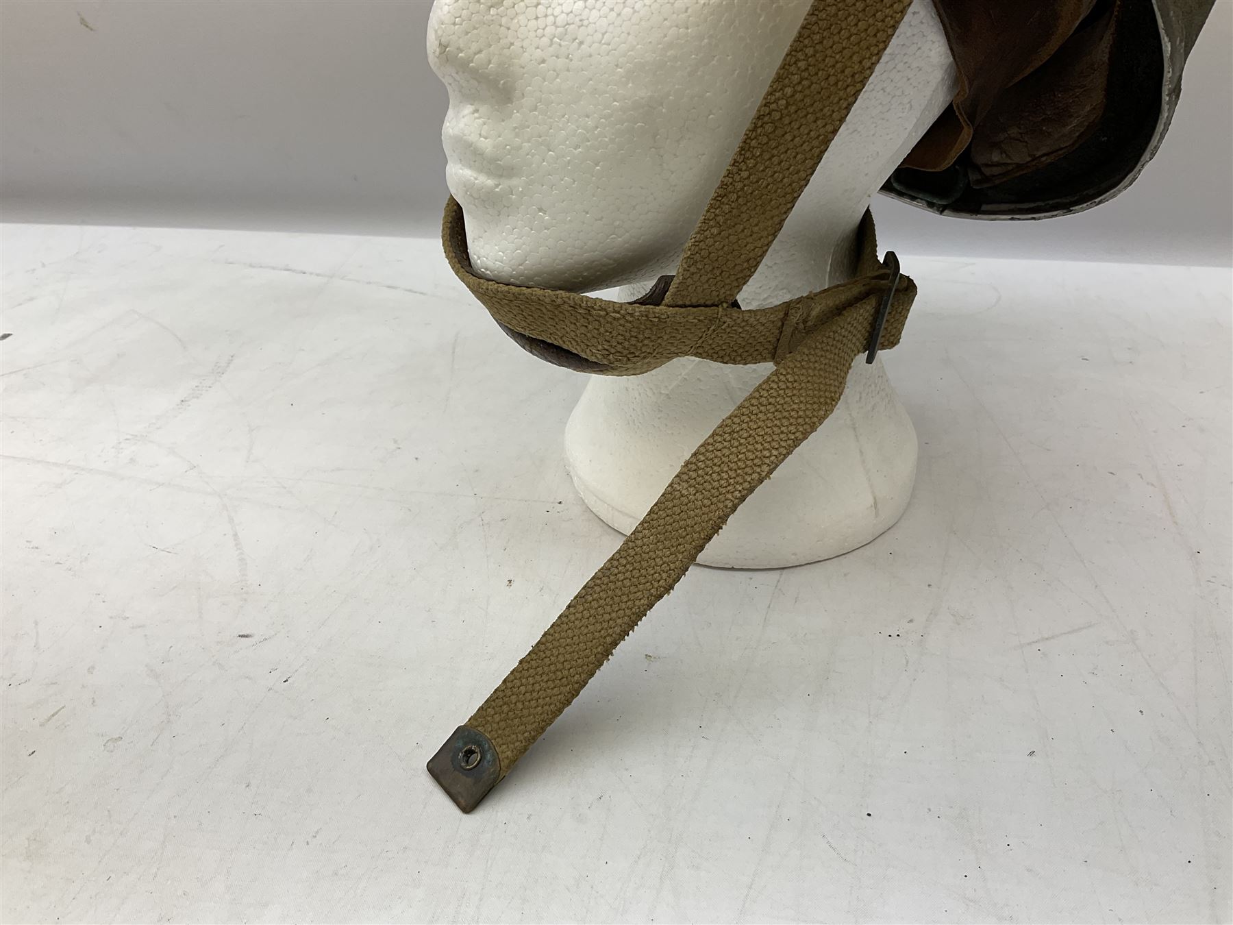 Post-WW2 British Airborne Troops,/Paratroopers Steel Helmet with green textured paint finish, leather and sponge liner and three point chinstrap mounting; liner marked BMB II 1953 71/4