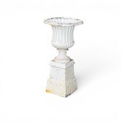 Victorian design white painted cast aluminium garden urn on plinth, fluted bowl on squat pedestal, tapering base