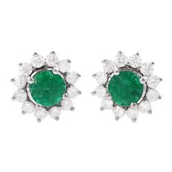 Pair of 18ct white gold round cut emerald and round brilliant cut diamond cluster stud earrings, stamped, total emerald weight approx 1.10 carat, total diamond weight approx 0.65 carat