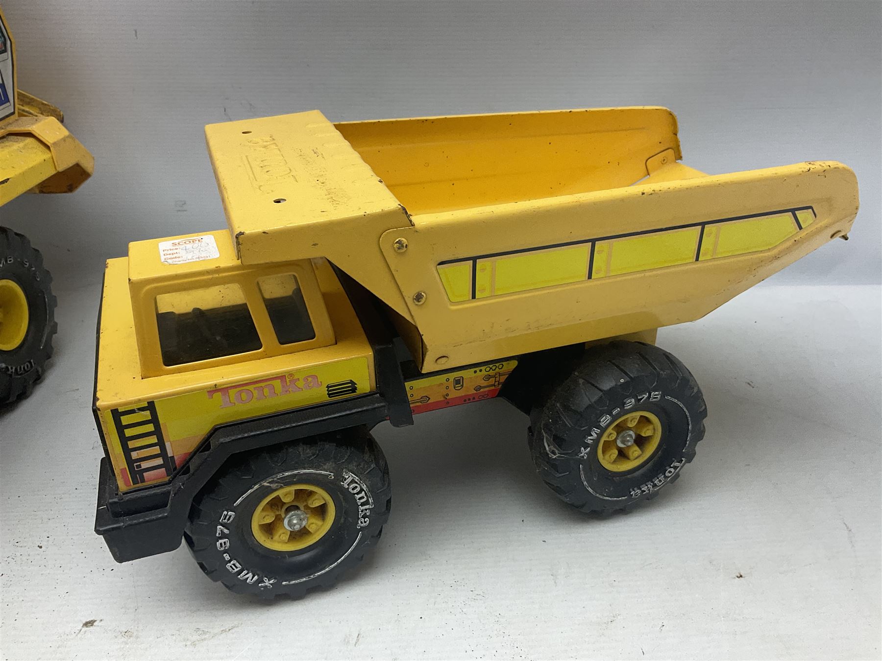 Tonka - five large scale pressed steel vehicles comprising Cement Mixer, Mighty Mobile Crane, Jeep and two Dumper Trucks (5)