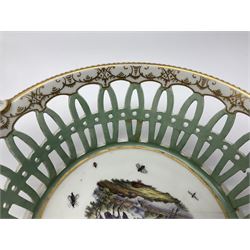 Pair of 19th century German openwork chestnut baskets, with twin handles and scrolling gilt border and star rim, painted to the centre with birds and insects, D22cm 