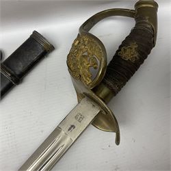 19th Century Prussian Infantry Officers 1889 pattern sword, the 80cm double fullered blade with makers mark to the ricasso for Weyersberg Kirschbaum & Co; curved brass top pommel with brass wire bound fish skin grip applied with crowned Wilhelm II monogram; leather finger loop; fixed cross guard with Imperial eagle and double bar knucklebow; in polished steel scabbard with two suspension rings L99cm overall