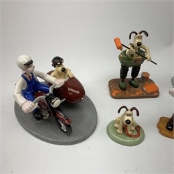 A group of six Coalport Wallace & Gromit figurines, comprising 'Hold on Gromit' no880/2000 with certificate, 'Decorating in Techno Trousers' no1195/2000 with certificate, 'Reading for Take Off', 'Do something Gromit', 'Feathers in disguise', 'Happy Birthday Gromit', each in maker's box with accompanying swing tag.