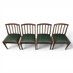 Mid-20th century teak dining table and chairs, with stowable fold over leaf, raised on square tapering legs, the chairs with teak frames and reupholstered green leather seats