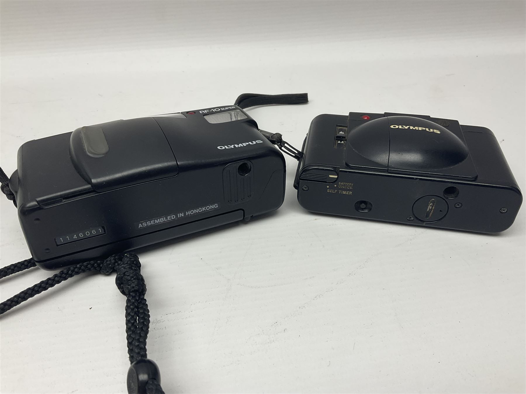 Four Olympus cameras, to include AF10 Super, XA2, Shoot & Go and Supertrip examples, together with Miranda ME-Z and Miranda ME-X DX cameras, an Agfa Optima camera with Agfa Paratonic DIN ASA Solitar 1:2.8/40 lens, Canon Snappy S camera and a Fujifilm Fine Pix S5700 camera, serial no 7WE12368 (8)