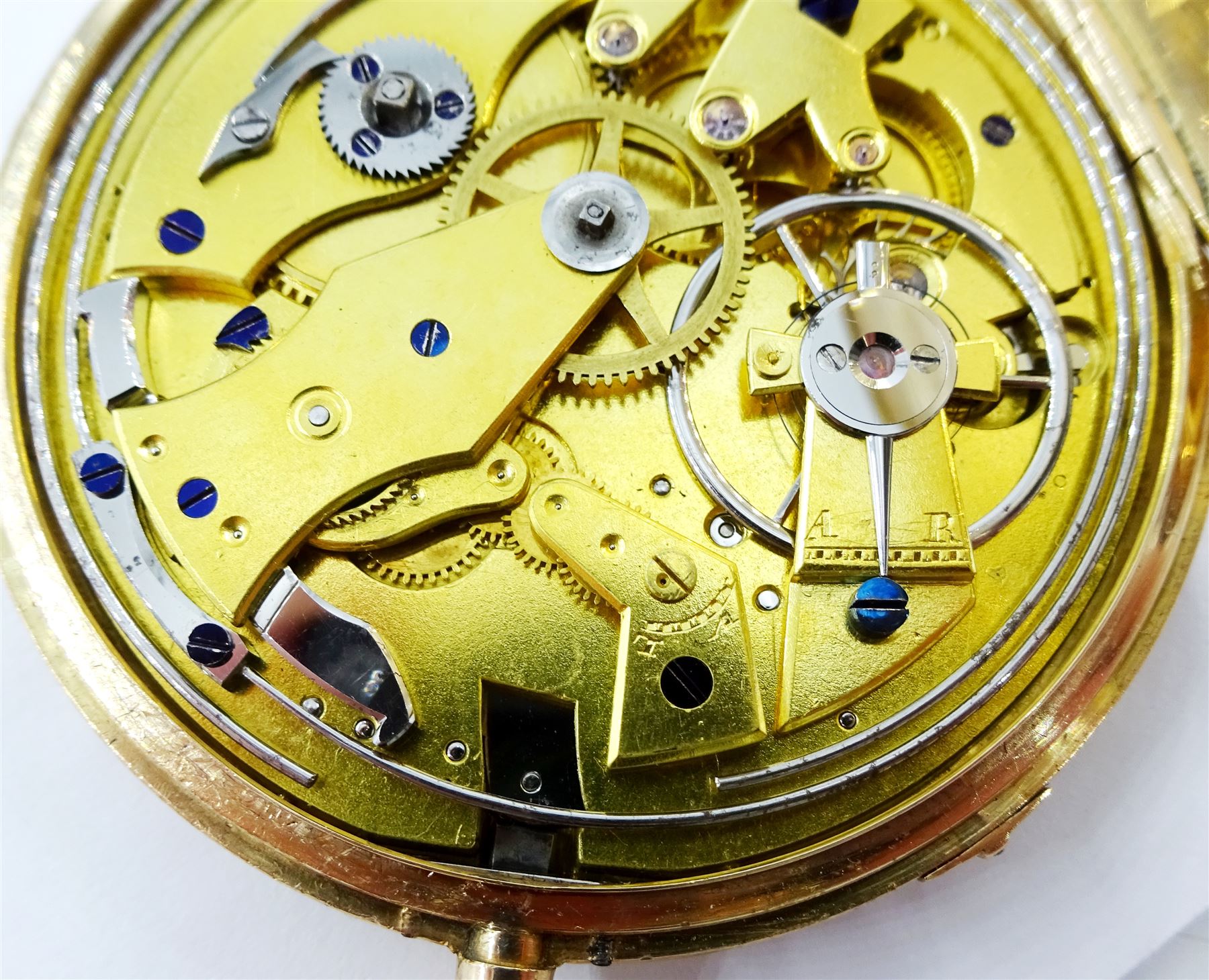 18ct gold open face key wound quarter repeating Swiss lever pocket watch by Garni en Pierre, No. 5090, the gold dust cover inscribed 'Echappement Libre a Ancre', plunge repeat in the pendant, silver engine turned dial with Roman numerals and subsidiary seconds dial