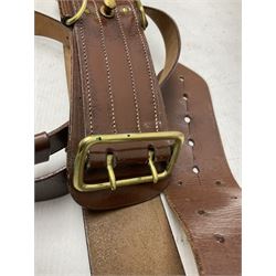 British Army General Staff officer's peaked cap by Herbert Johnson London in Moss Bros. delivery box; two officer's Sam Browne leather belts; leather pistol holster and sword hanger; pair of leather gloves and pair of spurs