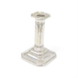 Group of silver mounted dressing table items, to include dwarf candlestick, with embossed ribbon decoration, comb holder, jar lid and six clothes brushes, all hallmarked 