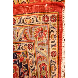  Kashan red ground rug, central medallion, repeating border, 409cm x 300cm  