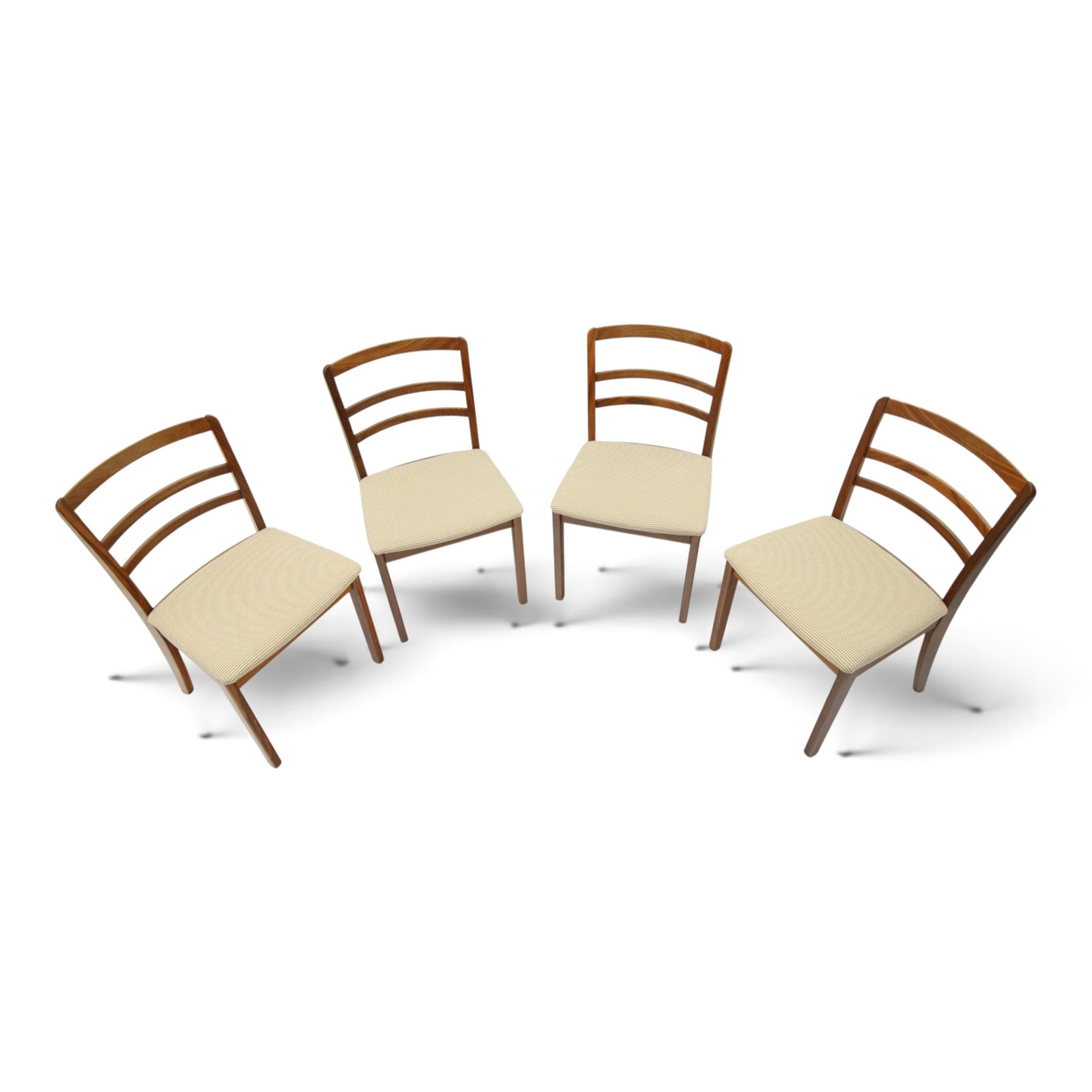 G-Plan - set of four mid-20th century teak 'Fresco' dining chairs, low ladder back on seats upholstered in chequered fabric, on square tapering supports