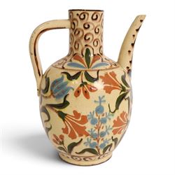 Iznik-style ewer, late 19th/early 20th century, the ovoid body painted with stylized flowers upon a cream ground, the neck with repeating scrolling boarder, H28cm