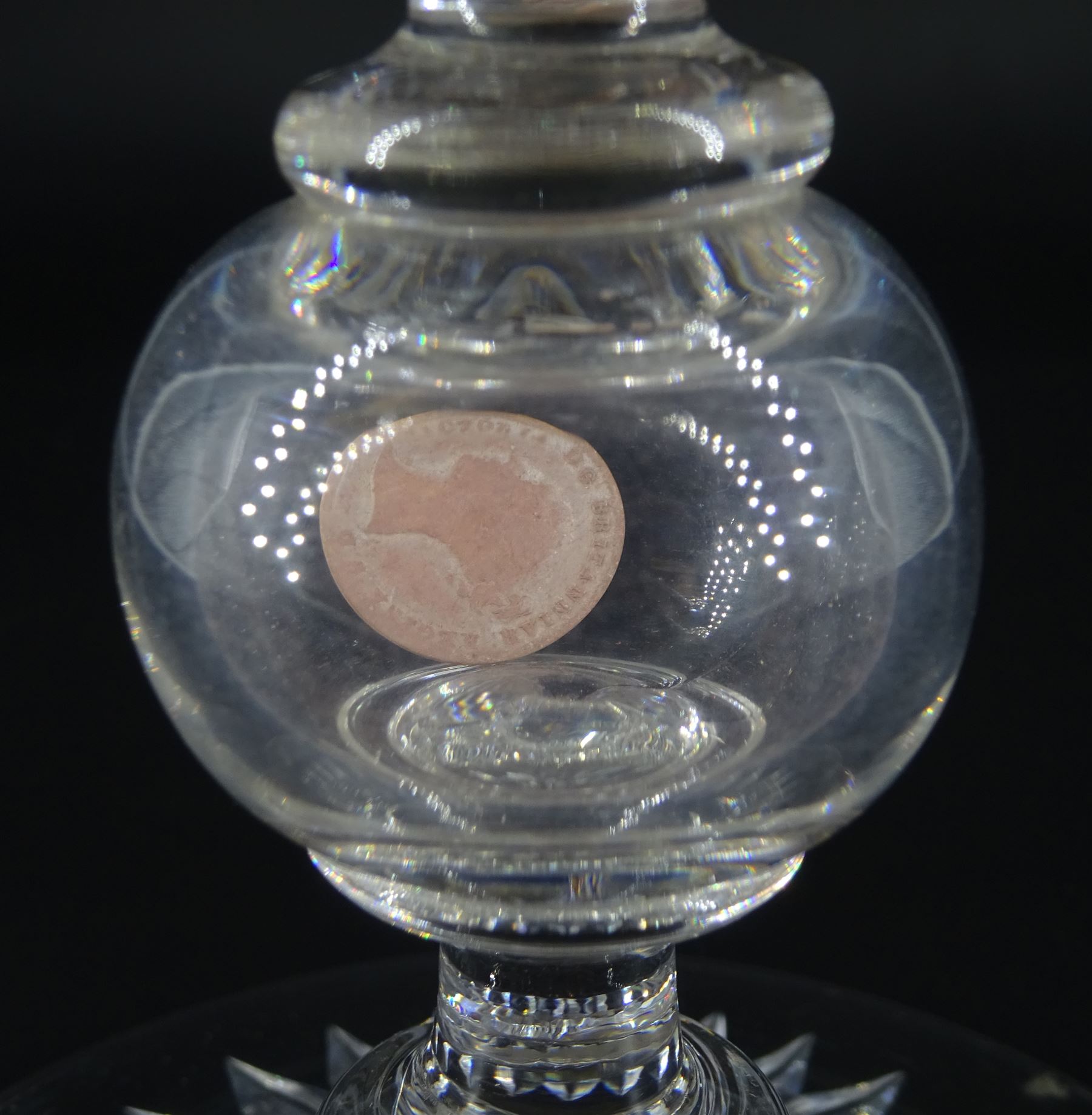 Late 19th century oversized glass goblet, the bowl engraved with cartouche containing dedication 'Jams Michie Died Jan 6th 1871 Aged 26 Years', surrounded by foliate detail, upon a hollow knopped stem containing a silver Victorian 1861 threepence and circular foot with star cut base, H19.5cm