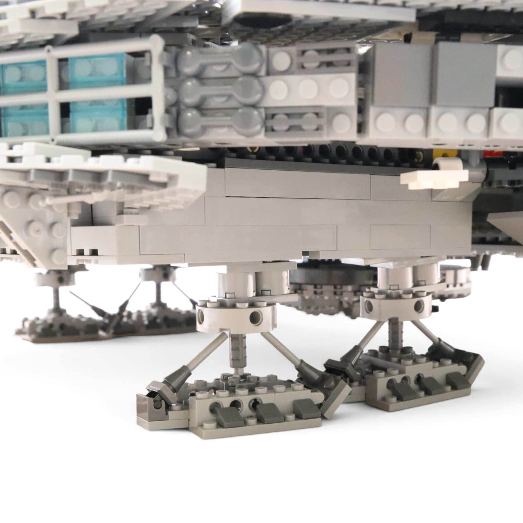 Three Lepin Star Wnrs built models, comprising Red Five X-Wing Starfighter no. 05039, Millennium Falcon no. 05132 and Super Star Destroyer no. 05028