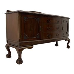 Early 20th century mahogany bow front sideboard, fitted with three drawers and two cupboards, ball and claw feet
