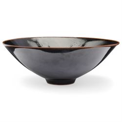 Poh Chap Yeap (Chinese/British 1927-2007); tenmoku glazed tea bowl with small circular foot, incised signature to base, D14cm