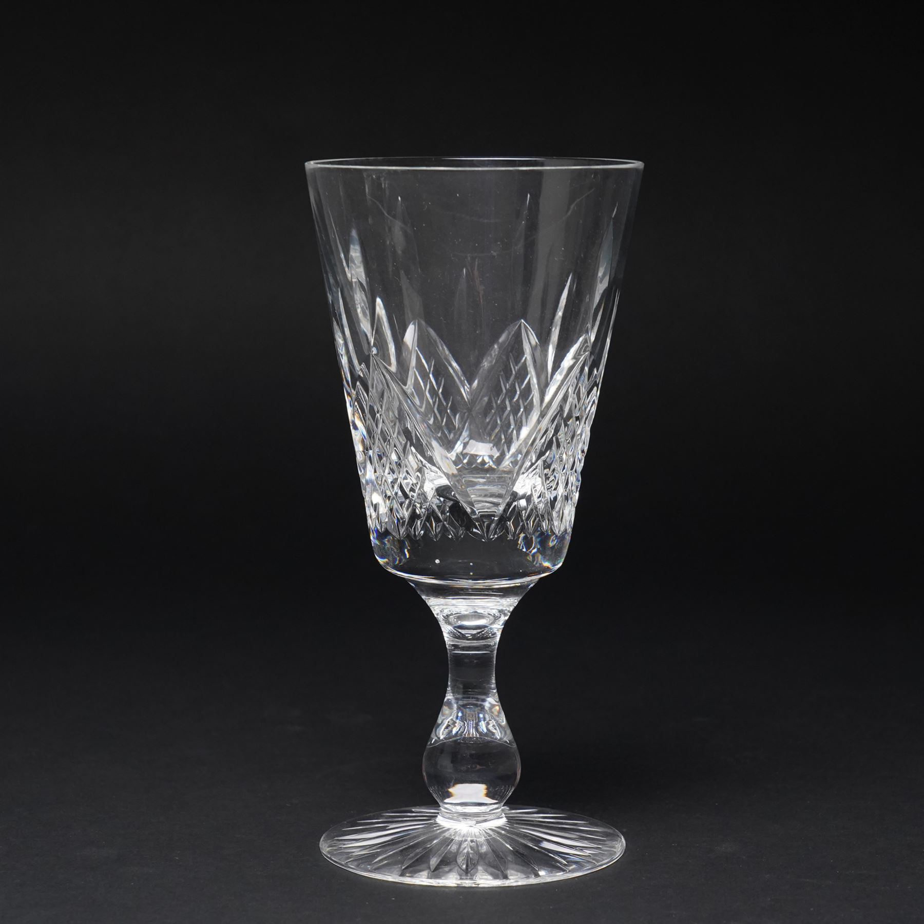 Quantity of Stuart crystal including six Cheltenham whisky tumblers, six claret glasses, six water tumblers and decanter with similar Stuart glass including sherry glasses, two brandy balloons, water jug etc
