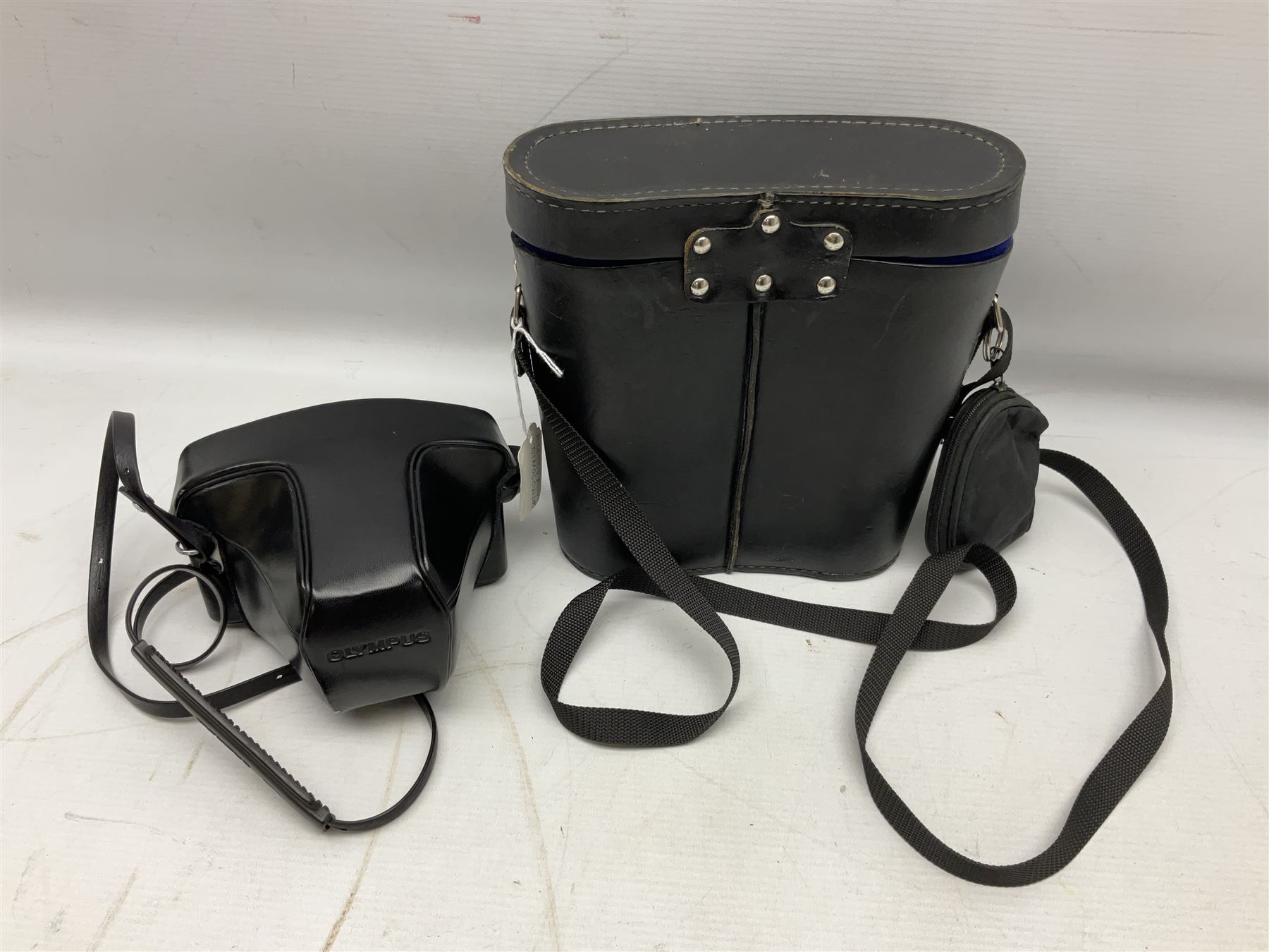 Olympus OM10 35mm camera, cased; pair of USSR 7 x 50 binoculars; cased; and pair of Le Jockey Club Paris binoculars