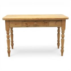 Victorian design stripped pine table, rectangular top with rounded corners, single centre drawer, raised on four turned legs