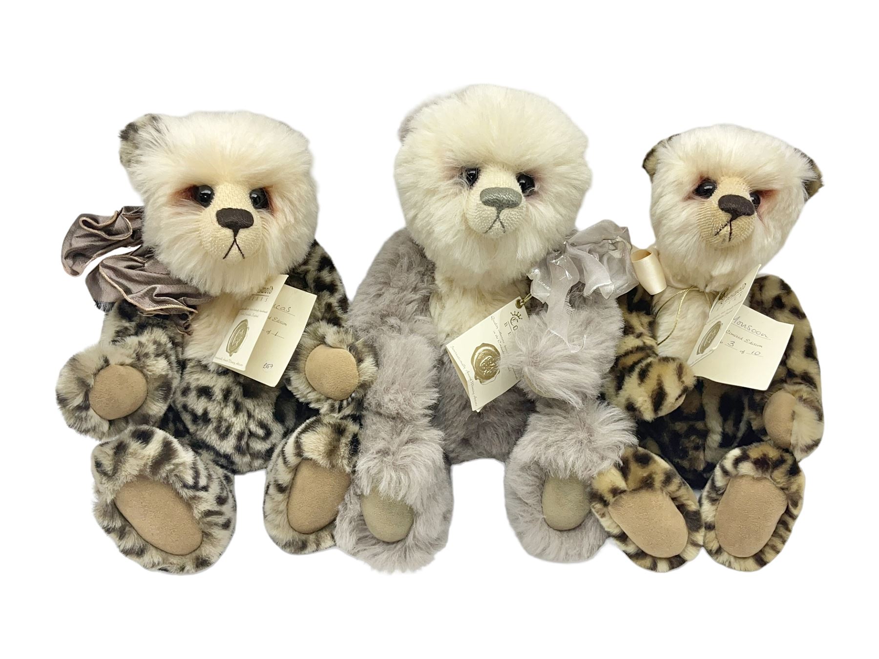 The Cotswold Bear Company - three limited edition teddy bears comprising ‘Lucas’ no. 1/1 H37cm and ‘Stonehenge’ no. 2/15 H39cm, both from the Back to the Wild Cub collection; and ‘Monsoon’ no. 3/10 H34cm from the Safari collection; all with original labels and purchase receipts (3) 