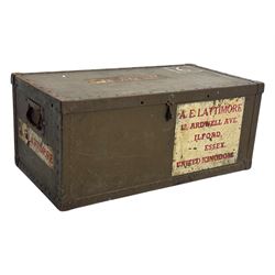Vintage metal bound steamer trunk, exterior labels reading 