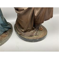 Two religious painted plaster figures of Mary and Joseph kneeling on oval plinths, with impressed mark 'Raffl et Cie Paris', H60cm 