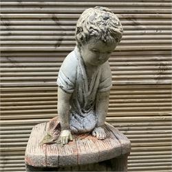 Cast stone ornament of a kneeling boy with a water feature  - THIS LOT IS TO BE COLLECTED BY APPOINTMENT FROM DUGGLEBY STORAGE, GREAT HILL, EASTFIELD, SCARBOROUGH, YO11 3TX