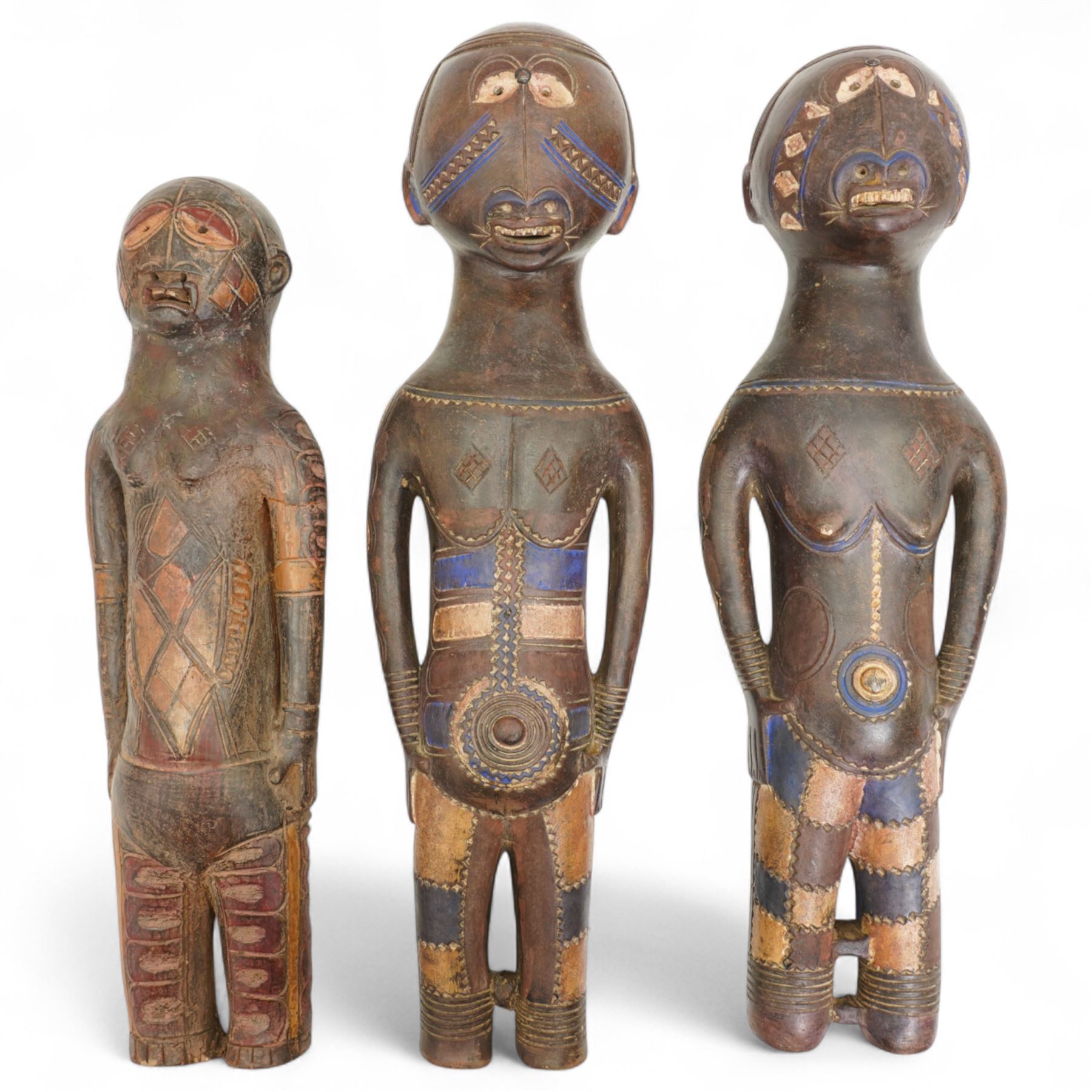  Family group of three terracotta Kouyou figures, Democratic Republic of the Congo representing father, mother and child, tallest 57cm